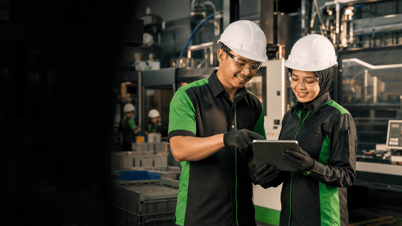 Plasto manufacturing team reviewing production data